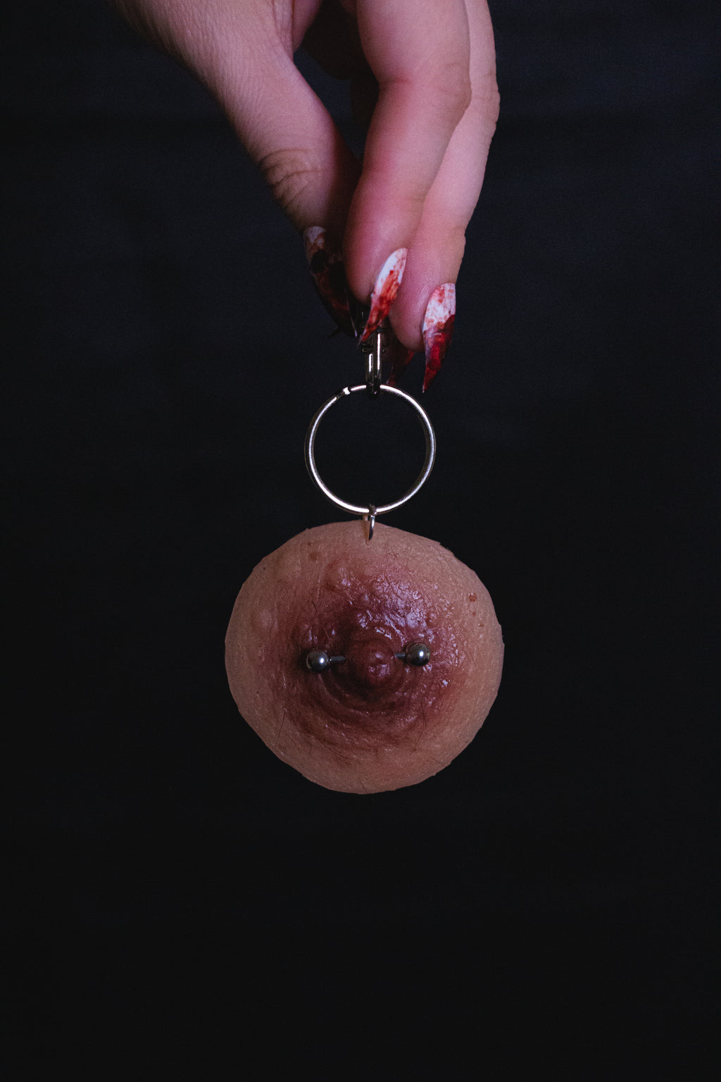 Pierced Nipple Keyring