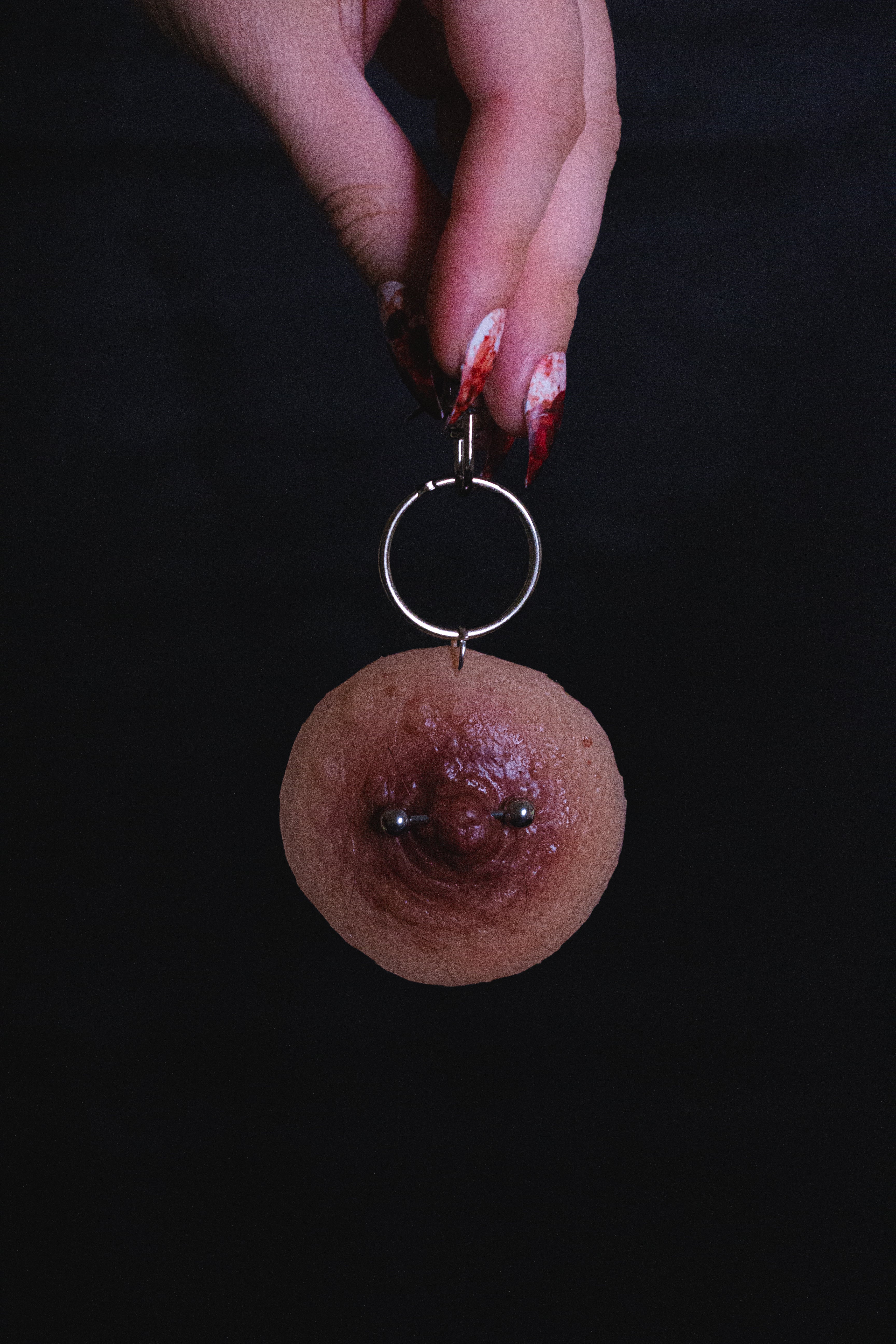 Pierced Nipple Keyring