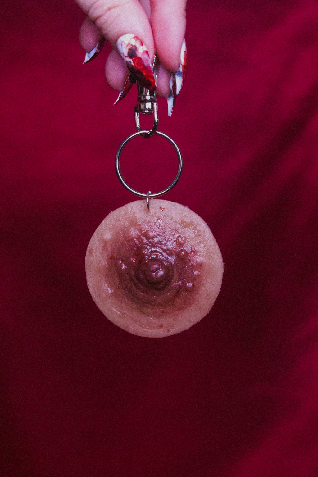 Unpierced Nipple Keyring