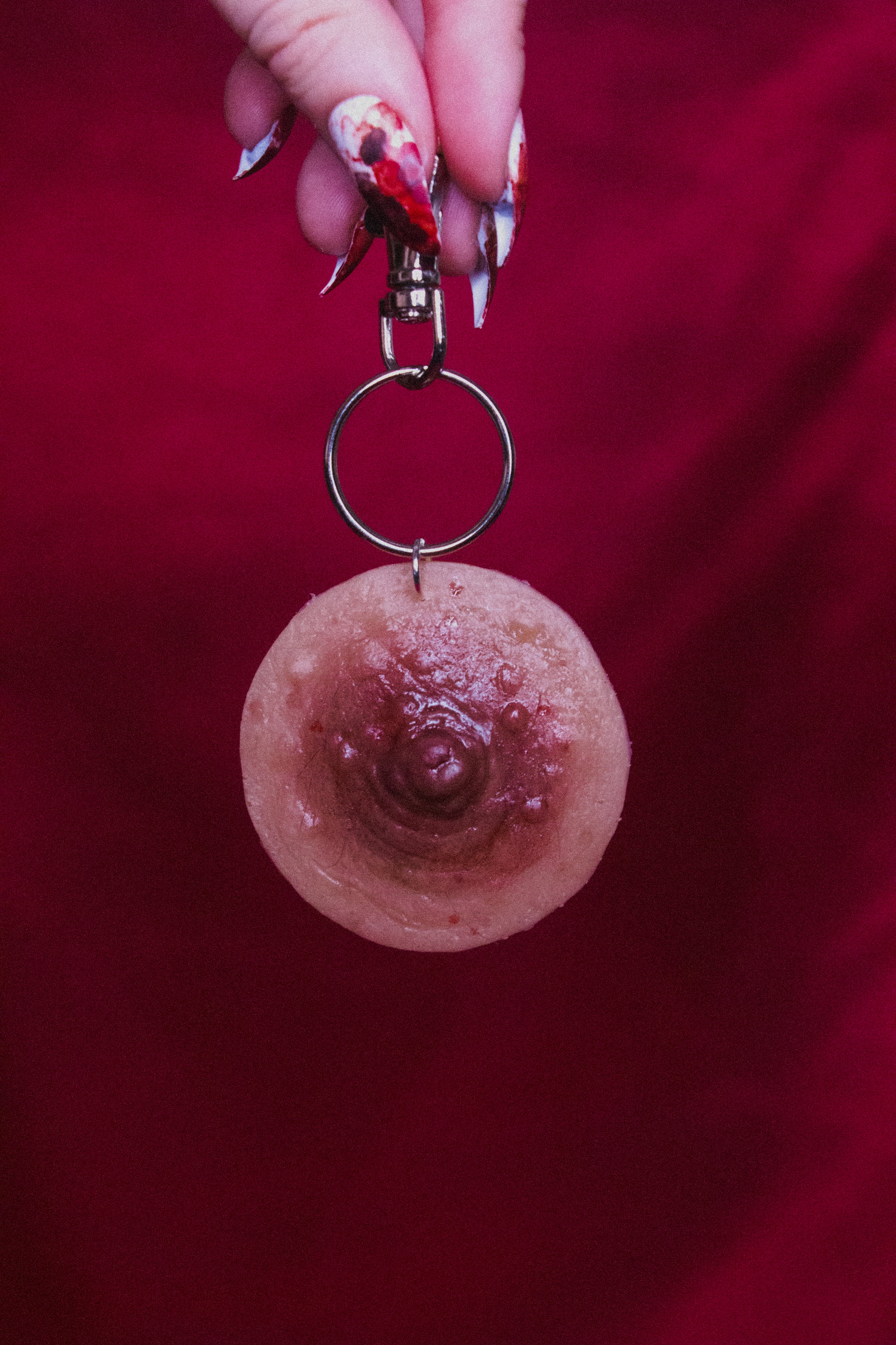 Unpierced Nipple Keyring