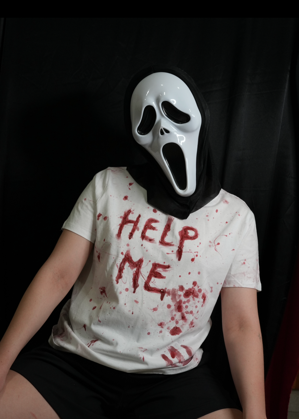 ‘Help me!’ Bloodied Shirt