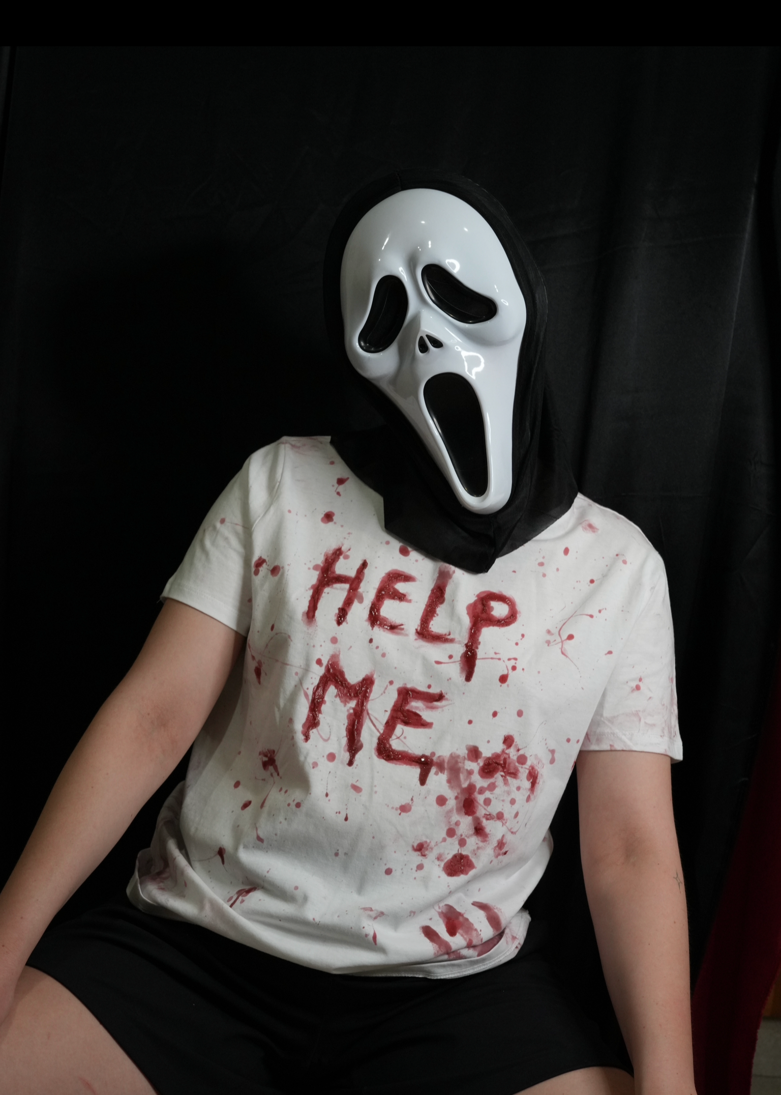 ‘Help me!’ Bloodied Shirt