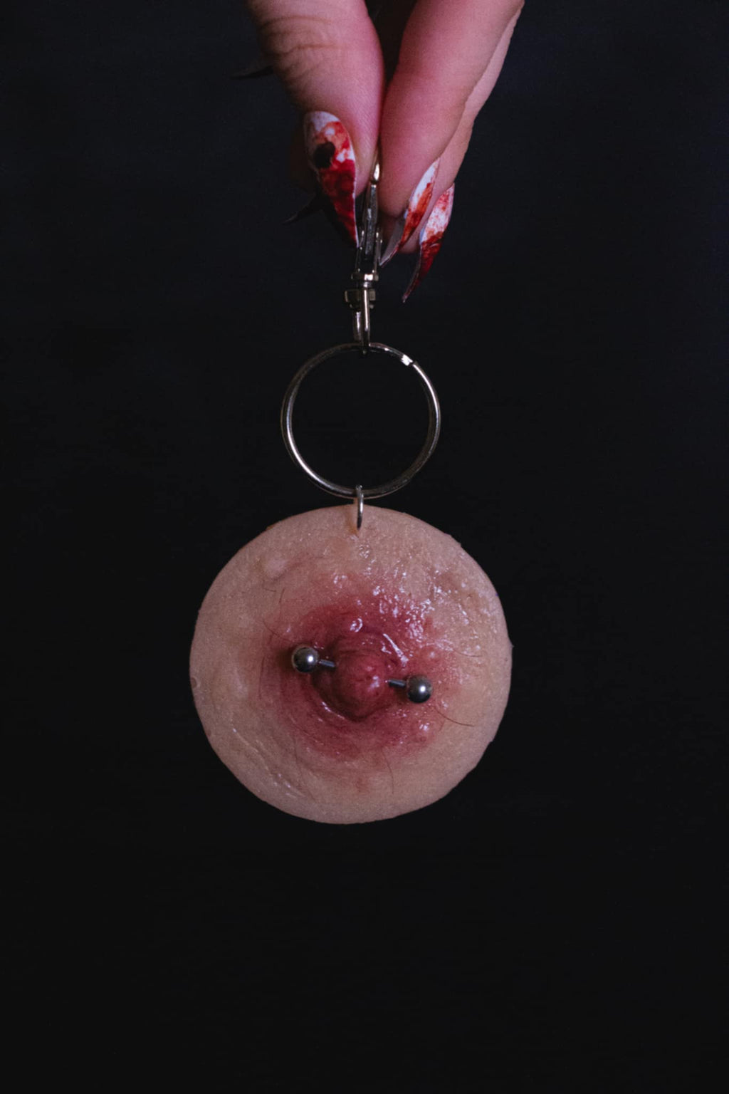 Pierced Nipple Keyring